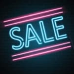 insegna luminosa al led con la scritta "Sale" celeste e fuxia